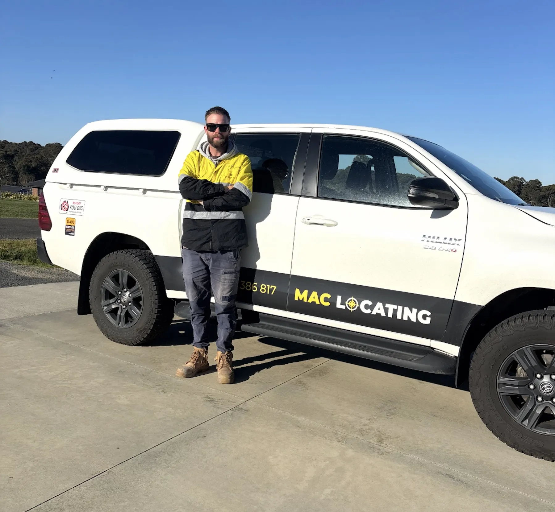 A MAC Locating team member with the locating ute